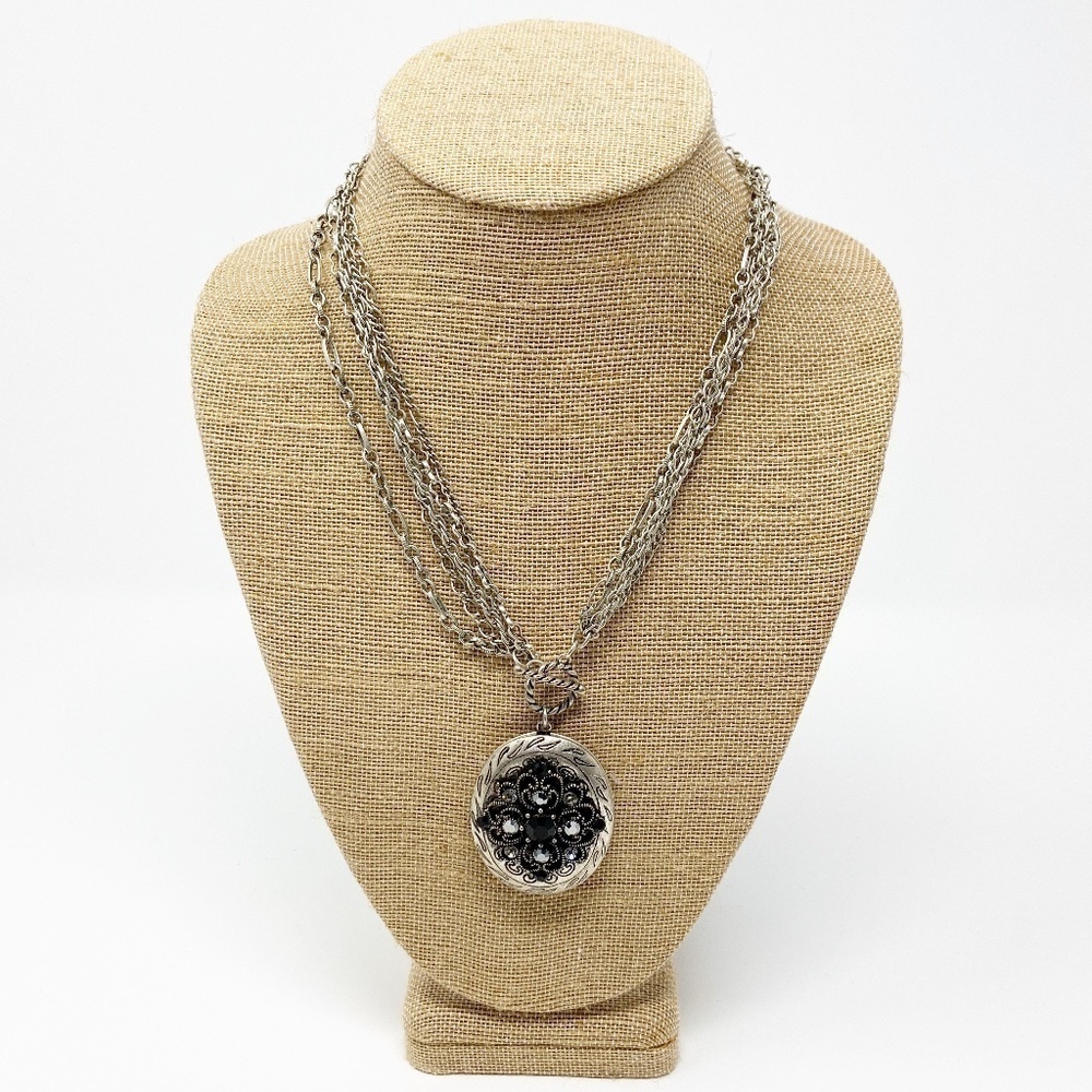 Black and silver multi-strand locket